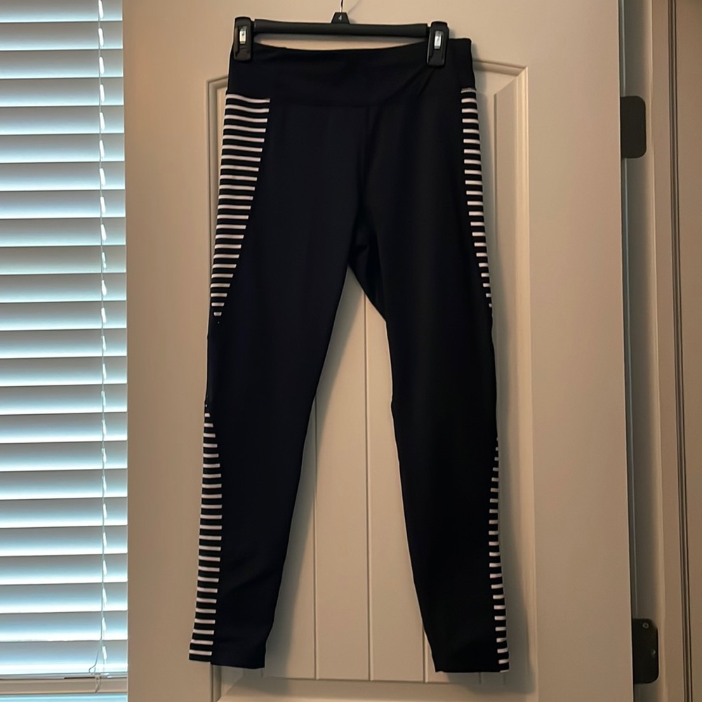 Tommy Hilfiger black with black and white stripe accent yoga pant. Size M